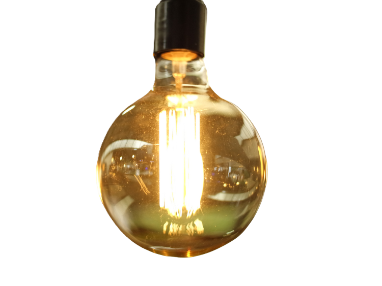 A warm-toned vintage light bulb with a round glass shape